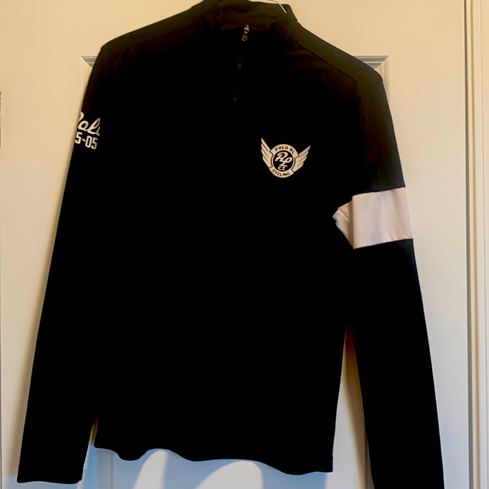 Polo long sleeve by Ralph Lauren.  Cycling them logos on front and back.